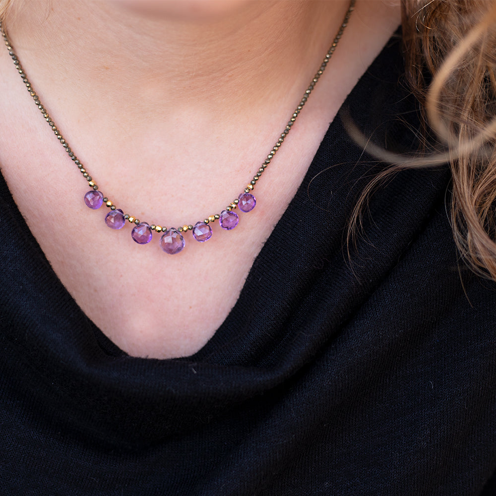 
                
                    Load image into Gallery viewer, Amethyst &amp;amp; Pyrite Quarter Ruffle Gold Necklace on model
                
            