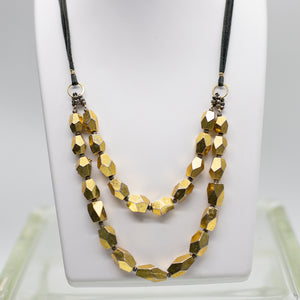 
                
                    Load image into Gallery viewer, Gold Pyrite Double Faceted Suede Necklace
                
            